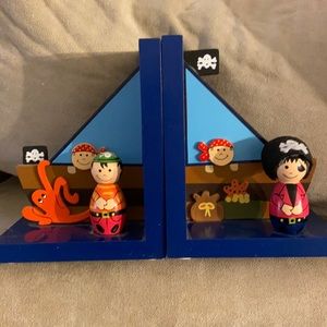 Pirate bookends, light switch, nautical beverage napkin holder